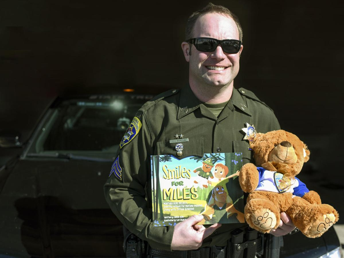 Montana Hope Project officer with toys