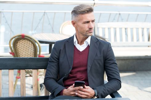 Professional man sitting at the chair