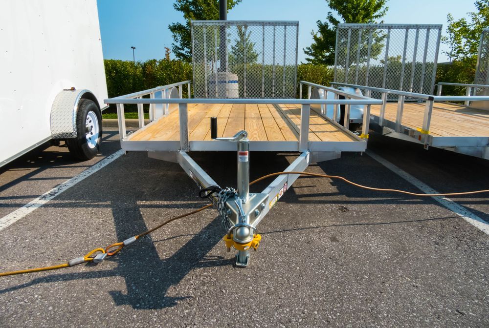 A Trailer With a Wooden Deck is Parked in a Parking Lot — Darwin Caravan & RV Centre In Berrimah, NT
