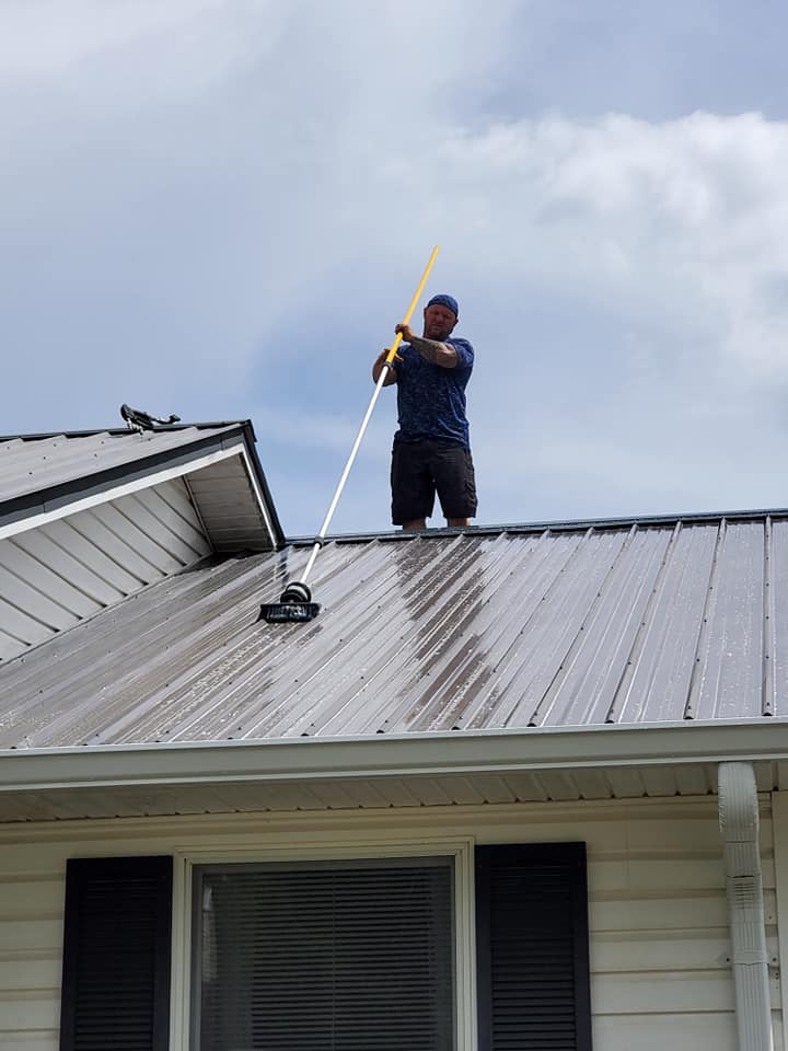 Man Cleaning the Concrete Terrace Floor — Kingsport, TN — C&E Cleaning Services
