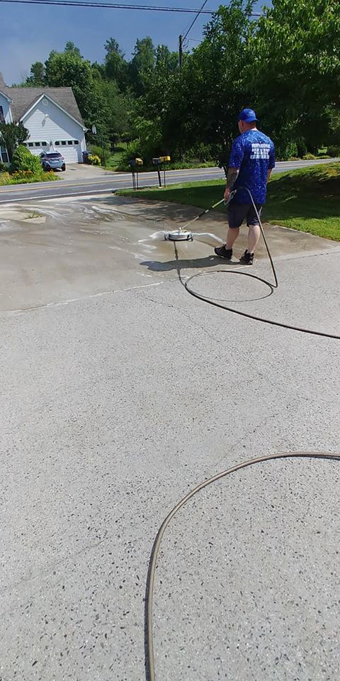 Worker Cleaning the Driveway — Kingsport, TN — C&E Cleaning Services