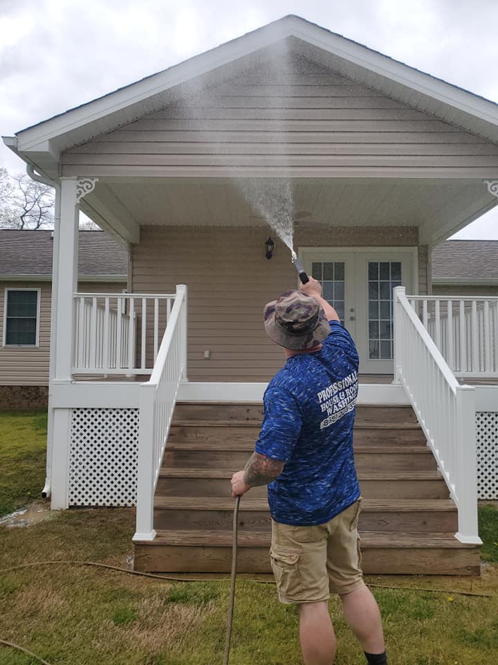 Man Pressure Washing the Fence — Kingsport, TN — C&E Cleaning Services