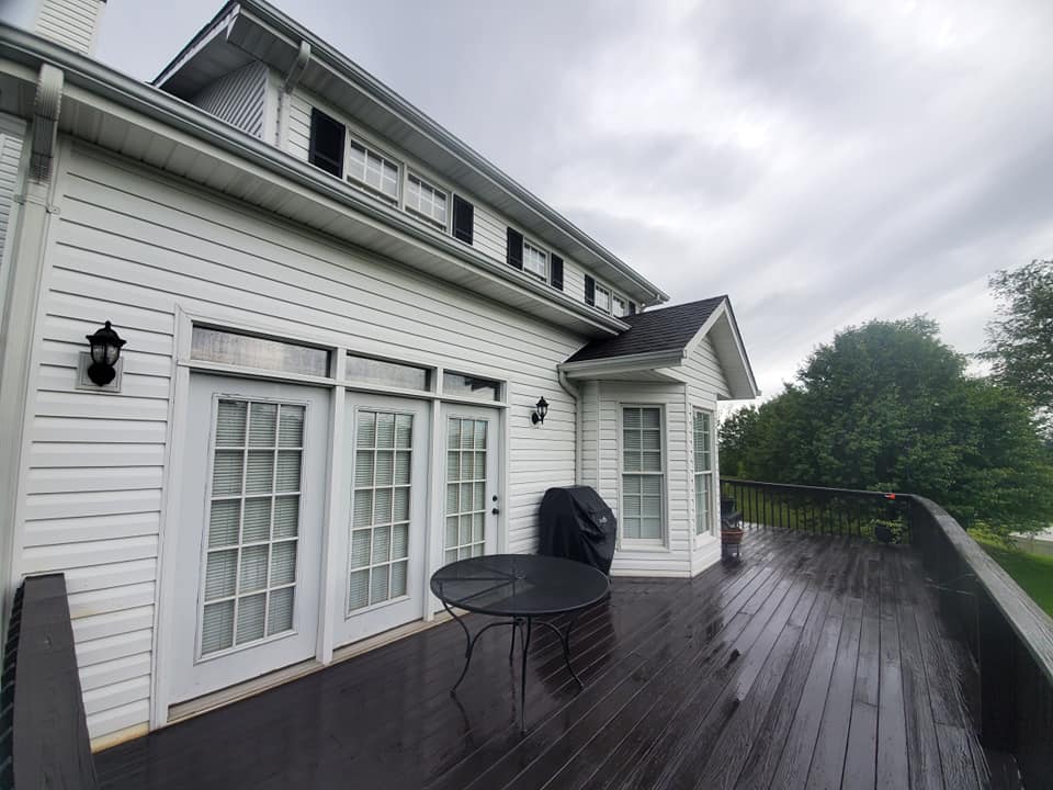 Worker Cleaning the Wooden Fence — Kingsport, TN — C&E Cleaning Services