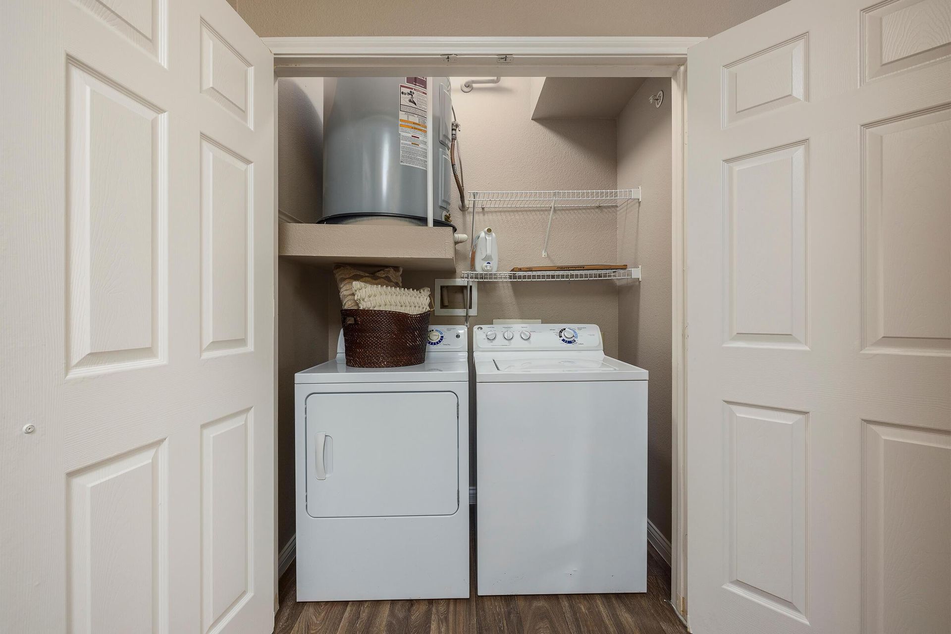 an apartment laundry room at Glen at Polo Park in Bentonville, AR.
