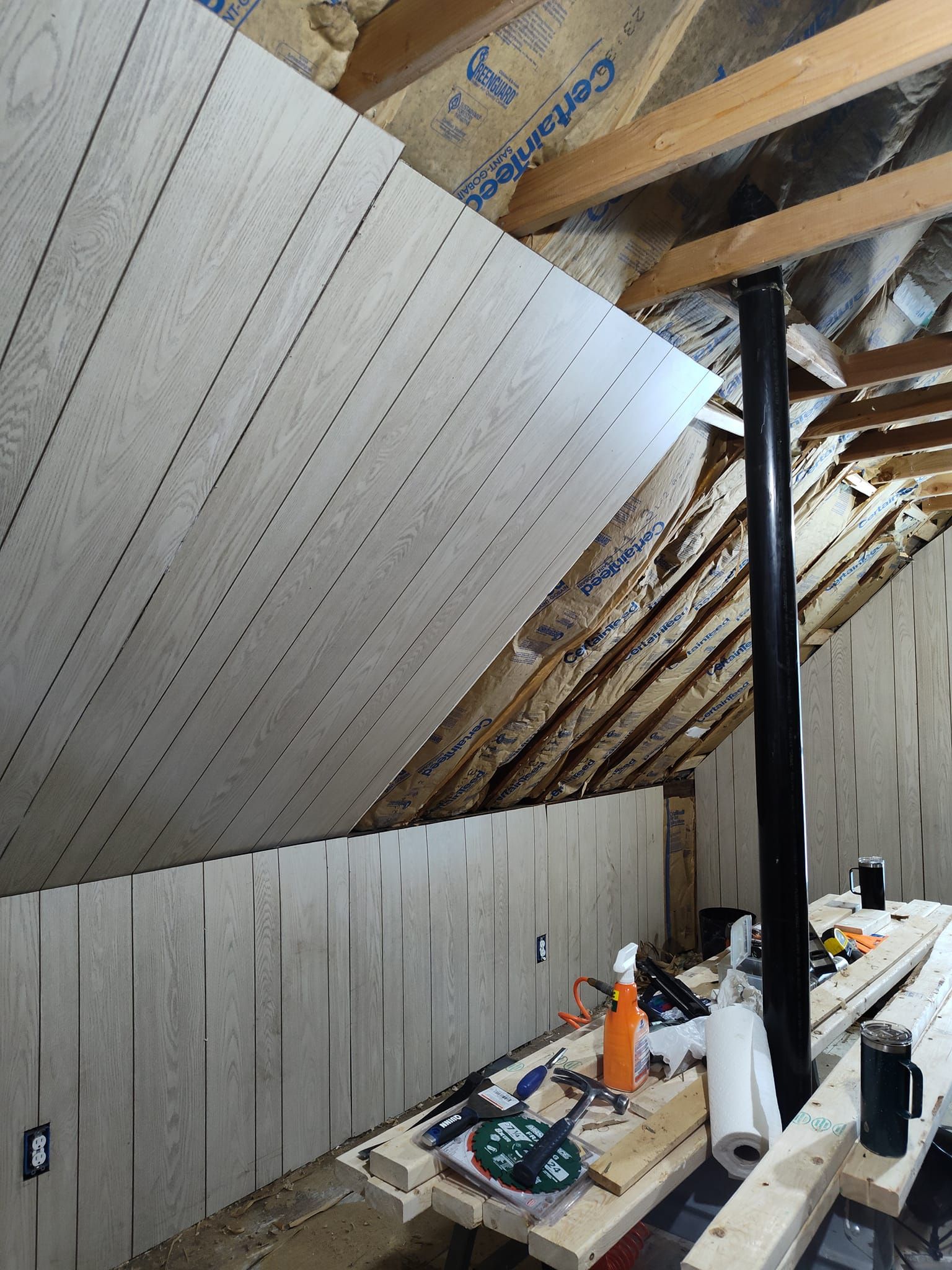 The attic is being remodeled and the ceiling is being installed.