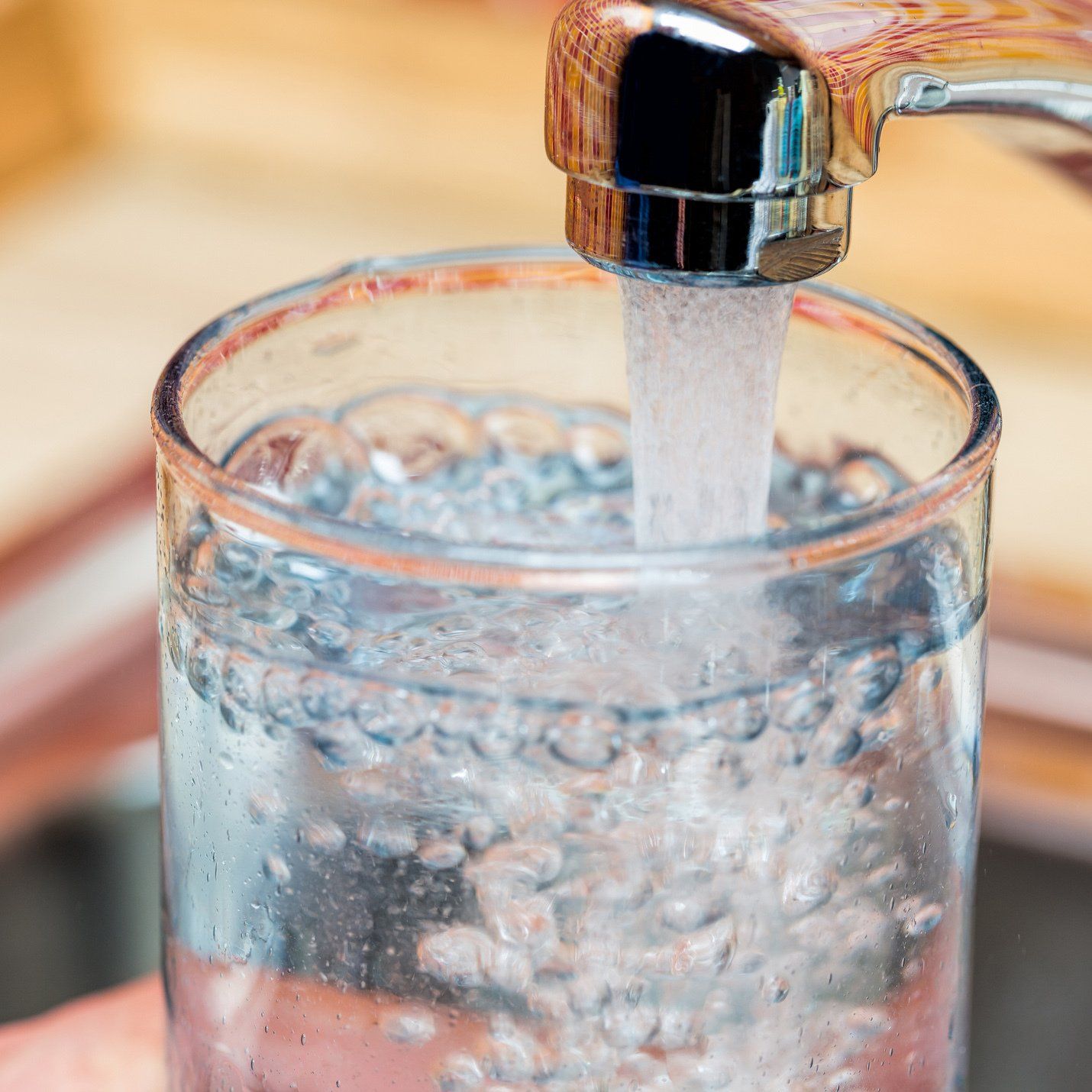 Filling Up a Glass with Water — Orlando, FL — Florida Pure Water Solutions