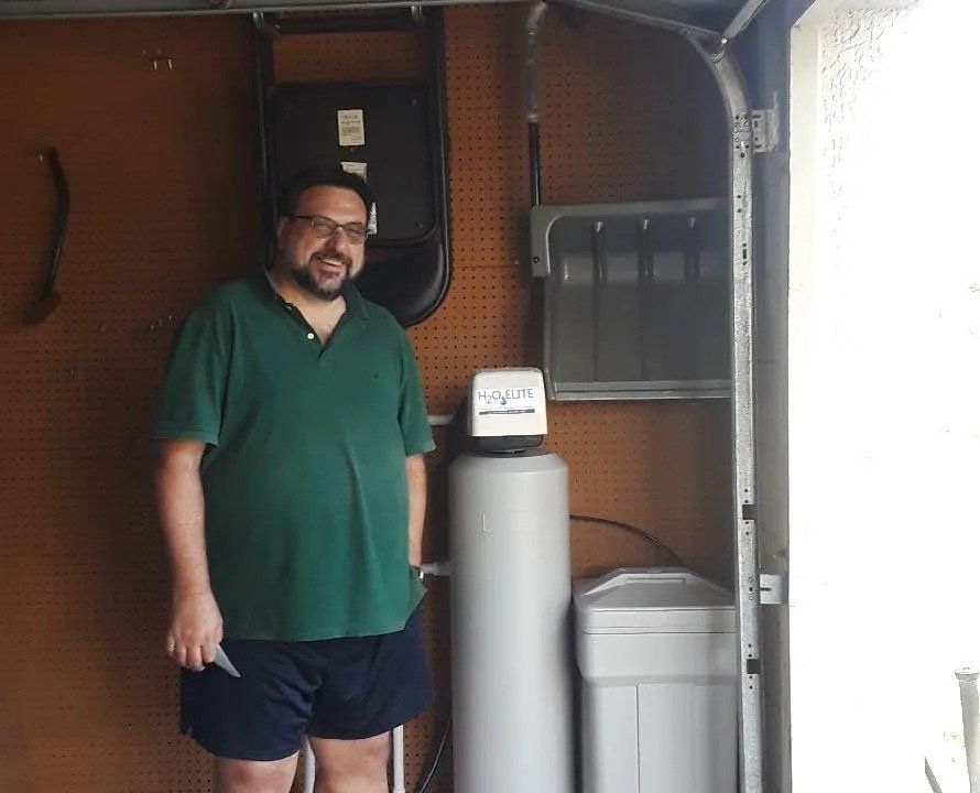 Man in a Green Shirt — Orlando, FL — Florida Pure Water Solutions