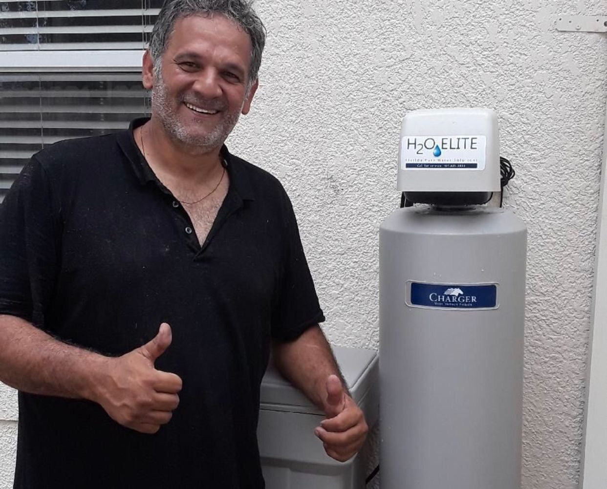 Filtration System and A Guy in Black Shirt — Orlando, FL — Florida Pure Water Solutions