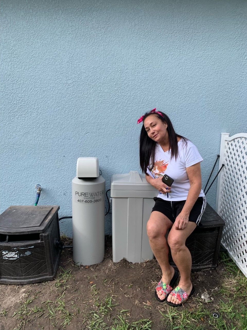 Woman and A Water Filtration Systems — Orlando, FL — Florida Pure Water Solutions