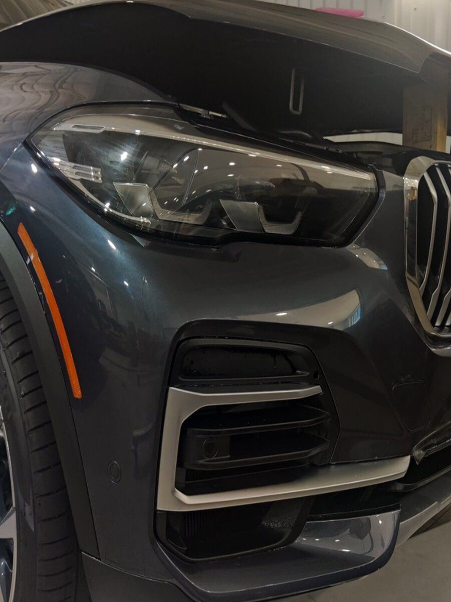 a close up of the front of a bmw x5 .