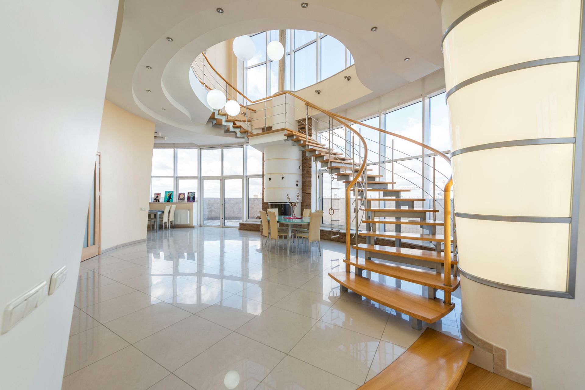There is a spiral staircase in the middle of the room.