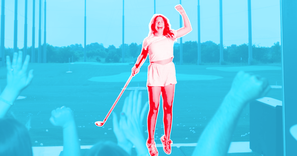 A group of people are watching a man swing a golf club