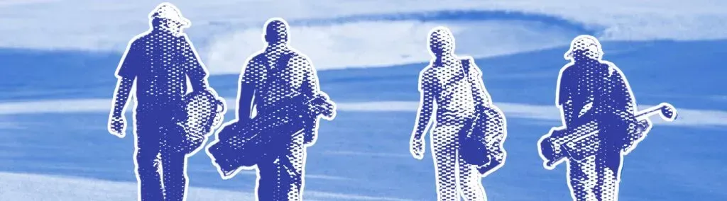 A group of people are walking in the snow.