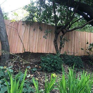 Property Divider — Backyard with Wooden Fence in San Leandro, CA