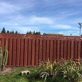 Privacy Fence — Brown Fence with the Sky in the Background in San Leandro, CA
