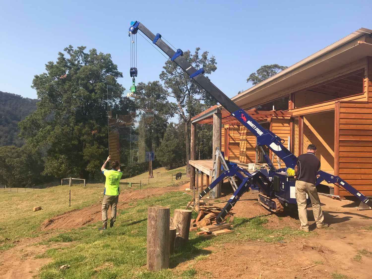 A Small Crane in Construction Area — South Coast Glass In South Nowra, NSW