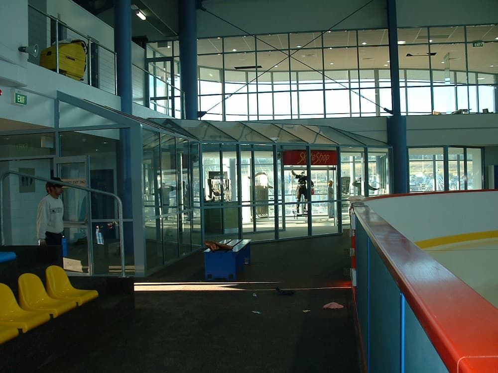 A Large Building With A Sign That Says 'Coca Cola' On It — South Coast Glass In South Nowra, NSW