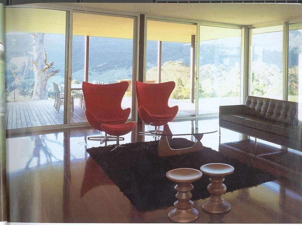 A Living Room With Two Red Chairs And A Couch — South Coast Glass In South Nowra, NSW