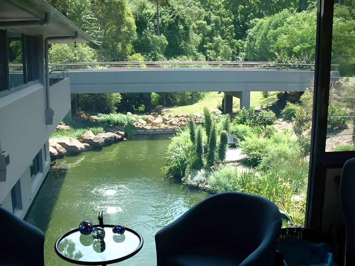 A View Of A River With A Bridge In The Background — South Coast Glass In Berry, NSW
