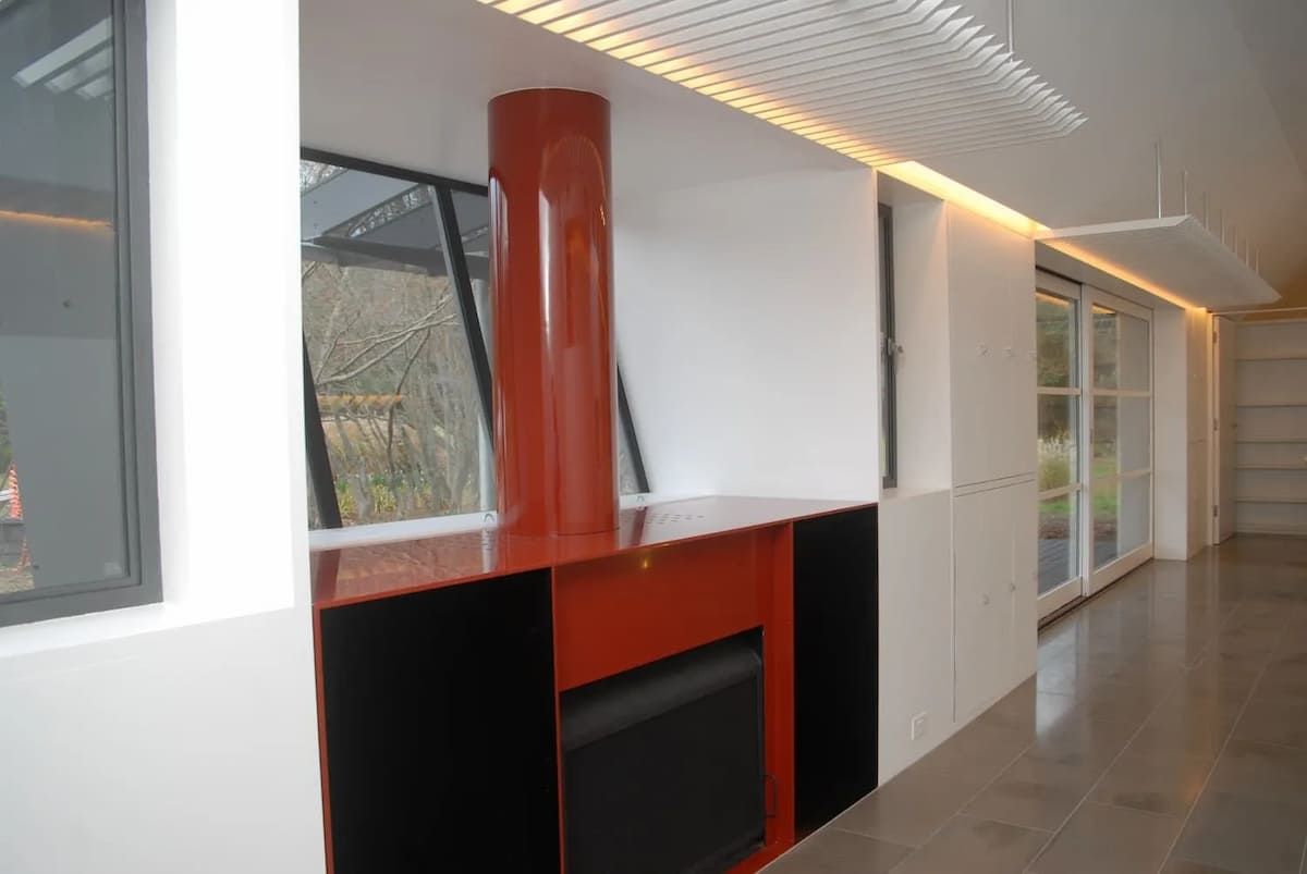 An Empty Room With A Red Fireplace In The Middle — South Coast Glass In South Nowra, NSW