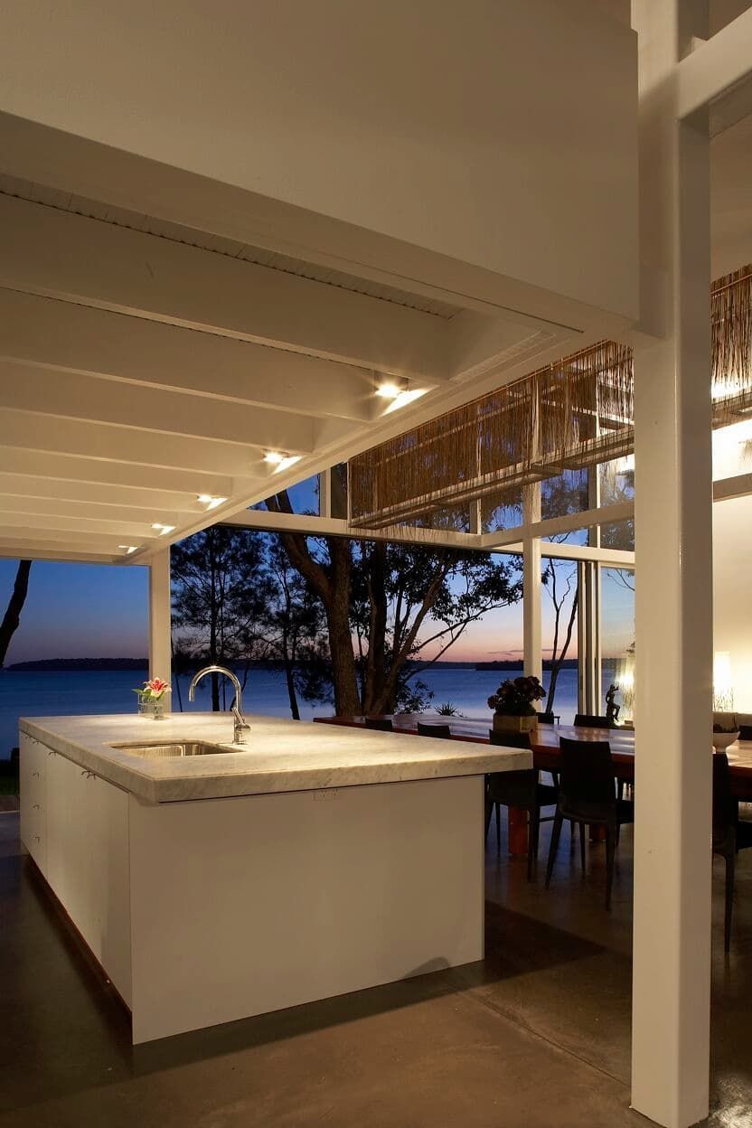 A Kitchen With A Large Island And A View Of The Ocean — South Coast Glass In South Nowra, NSW