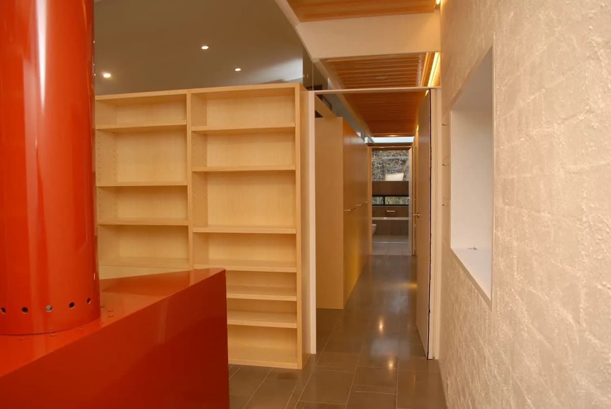 A Hallway With Shelves On Both Sides Of It — South Coast Glass In South Nowra, NSW