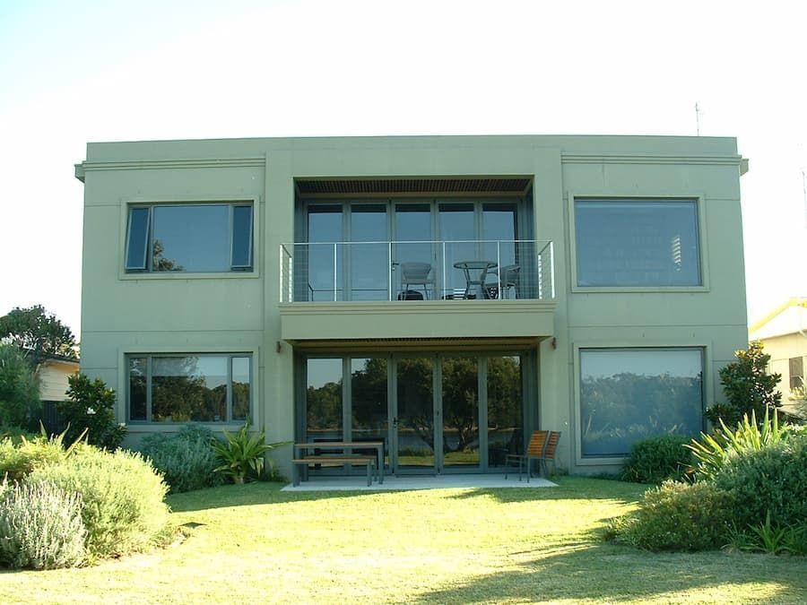 A Large House With Lots Of Windows And A Balcony — South Coast Glass In South Nowra, NSW