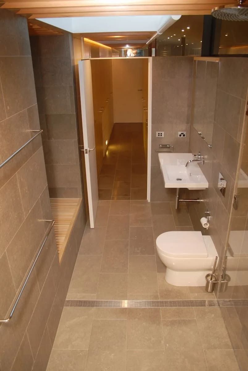 A Bathroom With A Toilet, Sink And Walk In Shower — South Coast Glass In South Nowra, NSW