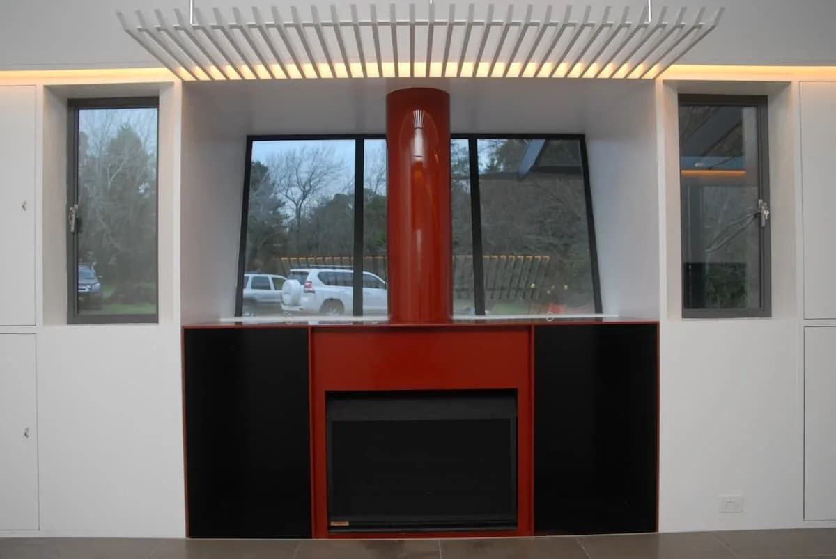 A Red Fireplace In A Room With A Lot Of Windows — South Coast Glass In South Nowra, NSW