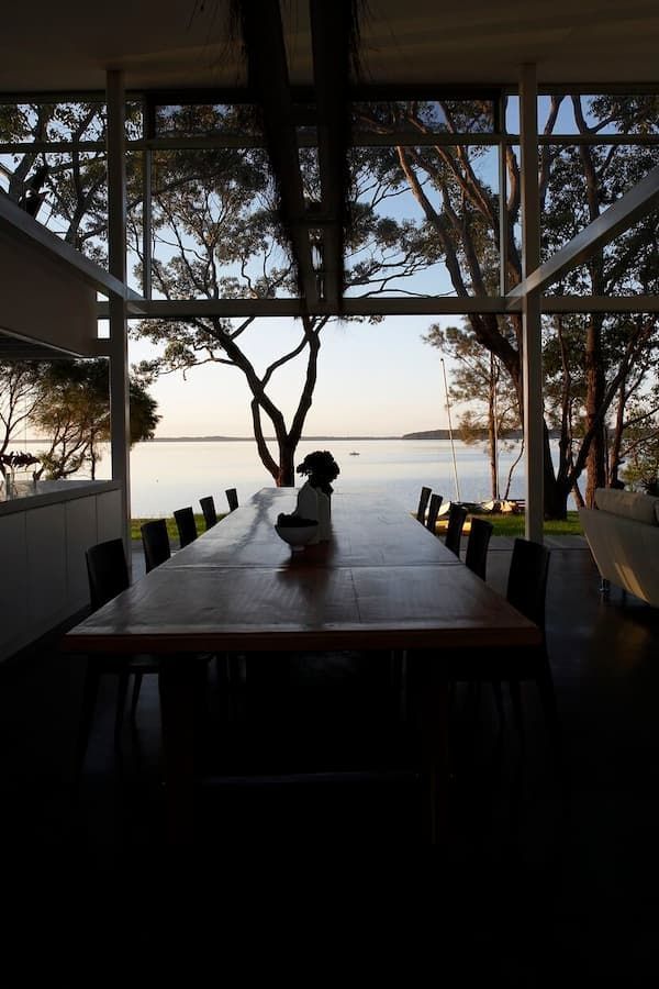 A Dining Room Table With A View Of A Lake And Trees — South Coast Glass In South Nowra, NSW
