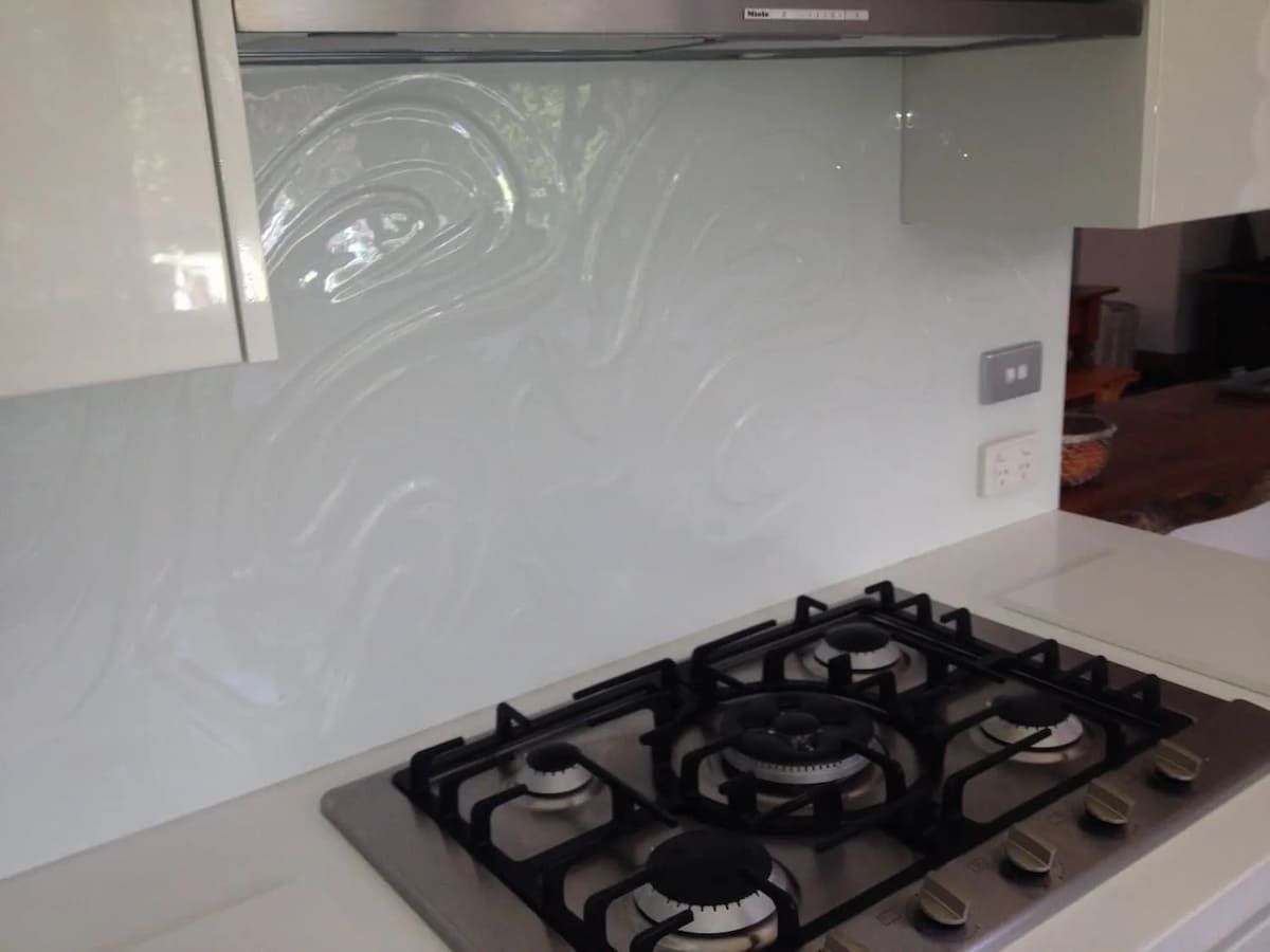 A Gas Stove In A Kitchen With A White Backsplash — South Coast Glass In South Nowra, NSW