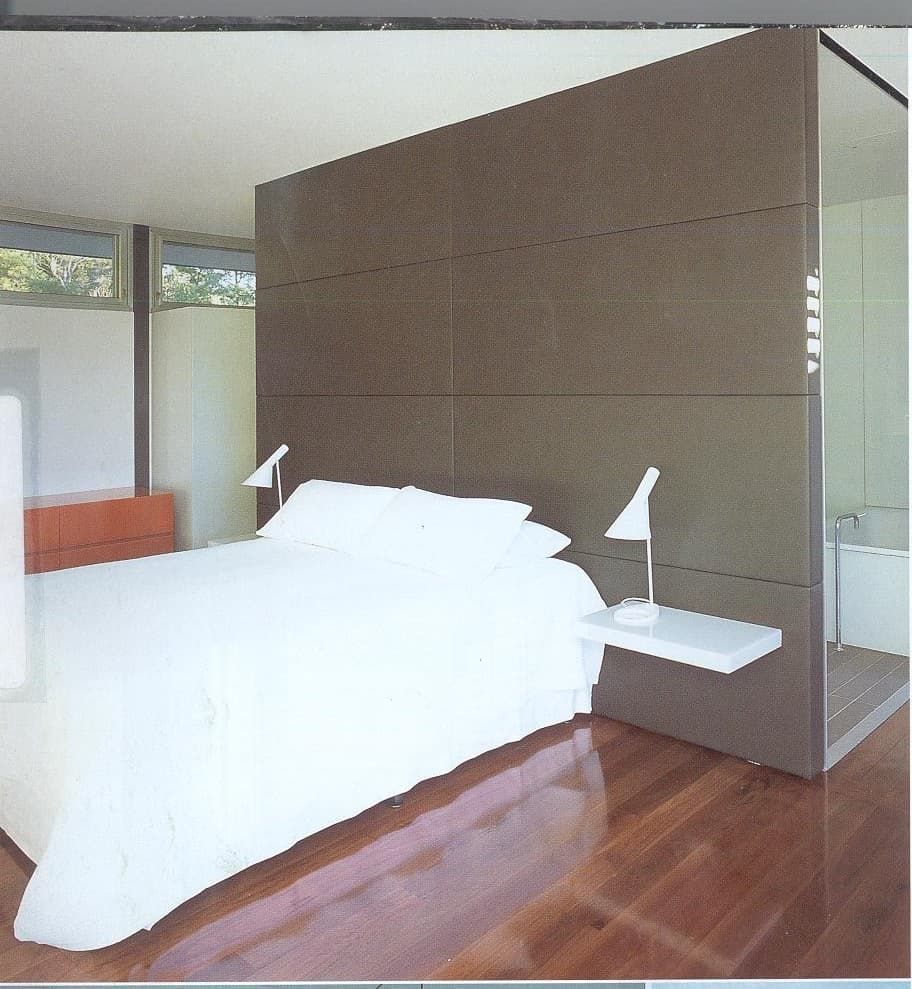 A Bedroom With A Large Bed And Two Lamps — South Coast Glass In South Nowra, NSW