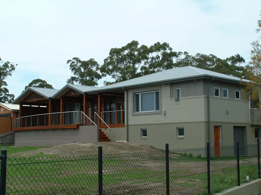 A Large House With A Fence In Front Of It — South Coast Glass In South Nowra, NSW