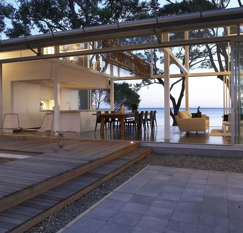 Modern glass-walled house with open interior — South Coast Glass In South Nowra, NSW