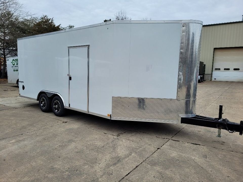 White enclosed trailer with a side door and diamond plate accents. | Gainesville Garage & Trailer Sales