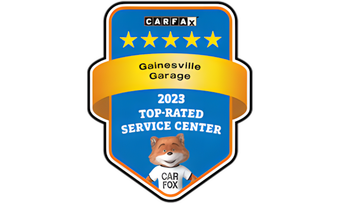 A badge that says gainesville garage top rated service center