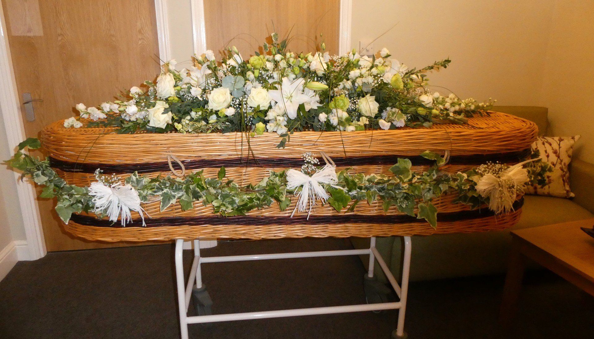 2.  Full Garland of variegated Ivy with white Raffia and Gypsophila bows