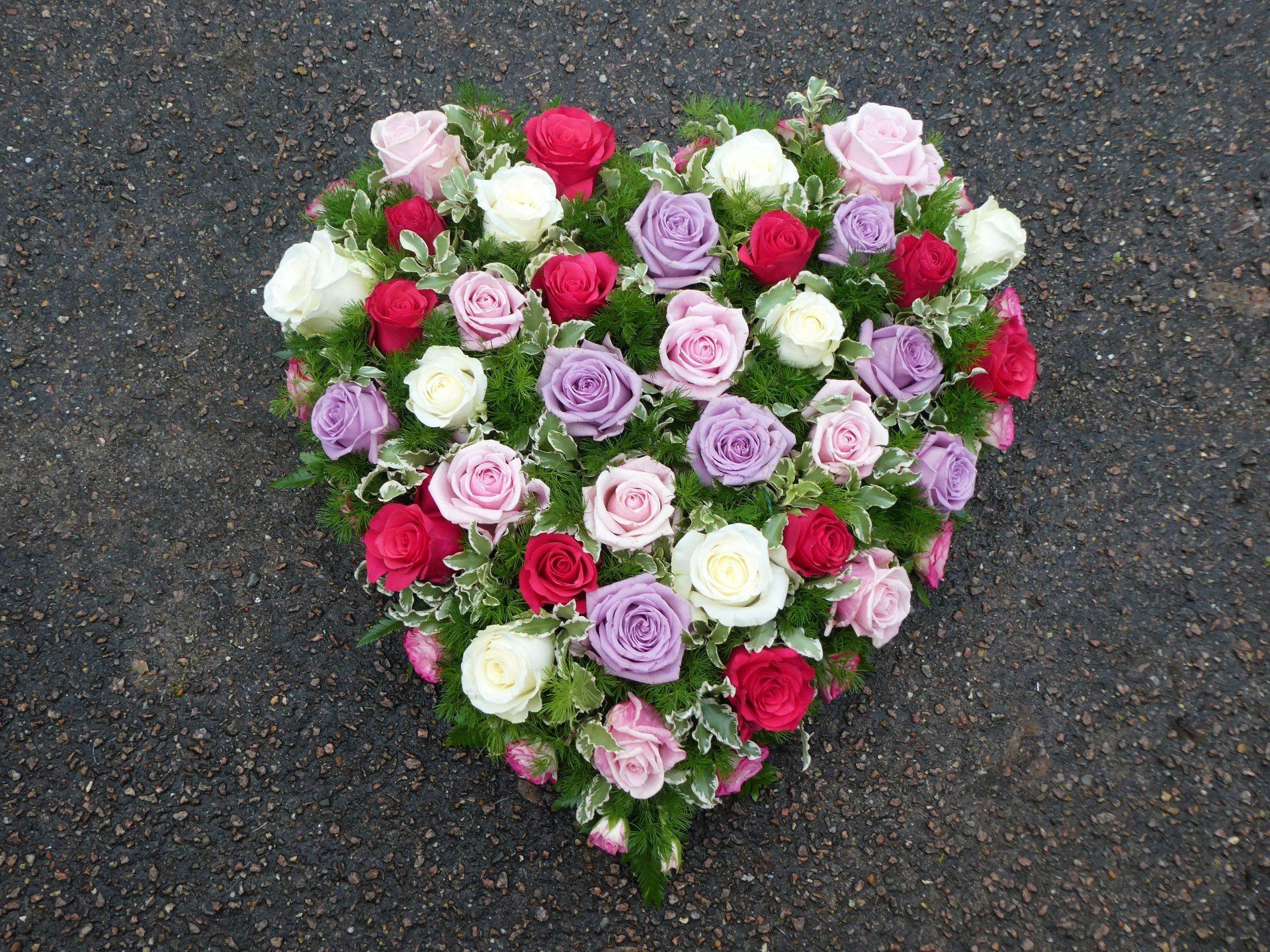 1.  Blue Rose heart with blue and white ribbon edging and ribbon sash