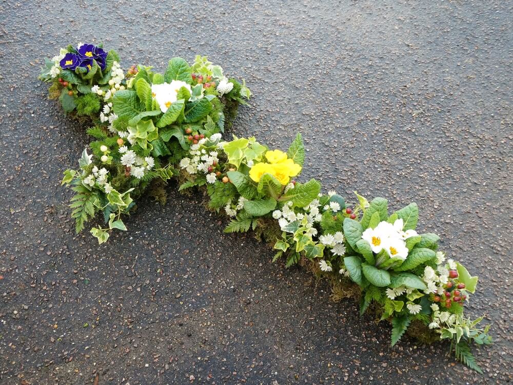 15. 4ft Planted Cross with Primroses, Ivy, Moss, Berries and Astrantia
