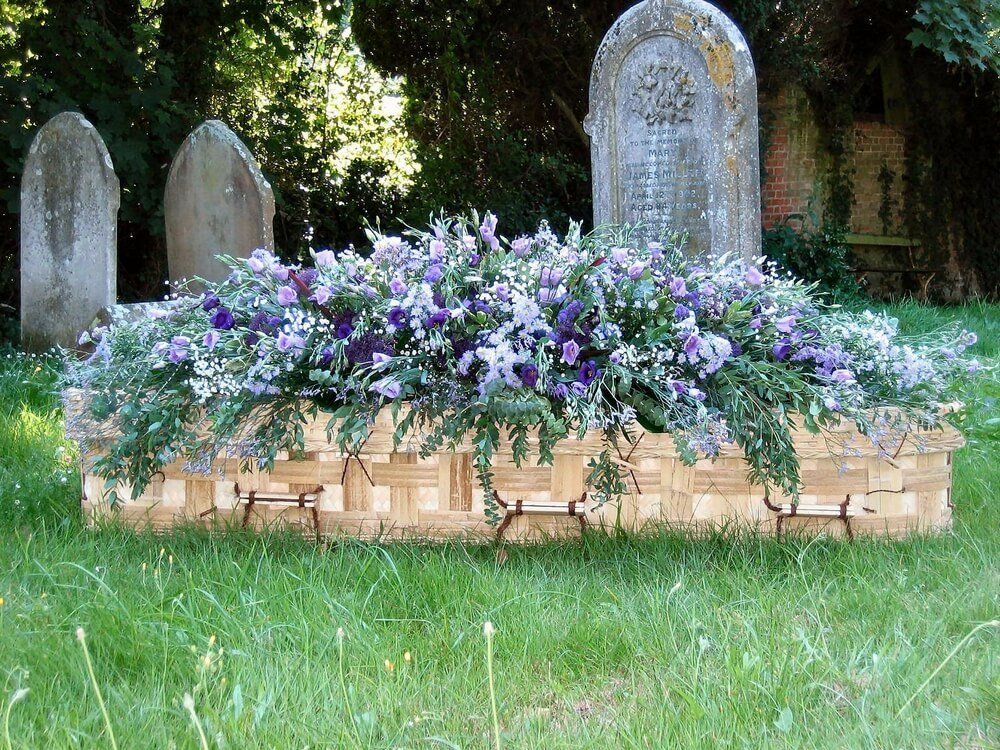 50. Beautiful oversized loose full coffin spray in purple. Lilac and white – Lisianthus, Asters, Statice, Gyp and Limonium