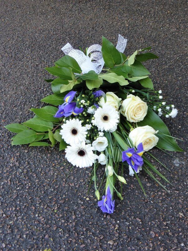 31. Sheaf of white Roses, Germini, September, Lisianthus and blue Iris