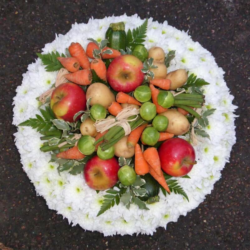 28.  14” White wreath with Vegetables and Fruit