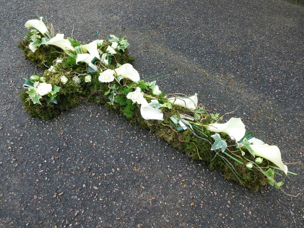 6.  4ft Natural Cross with white Callas, Rosebuds, twisted Willow and Ivy