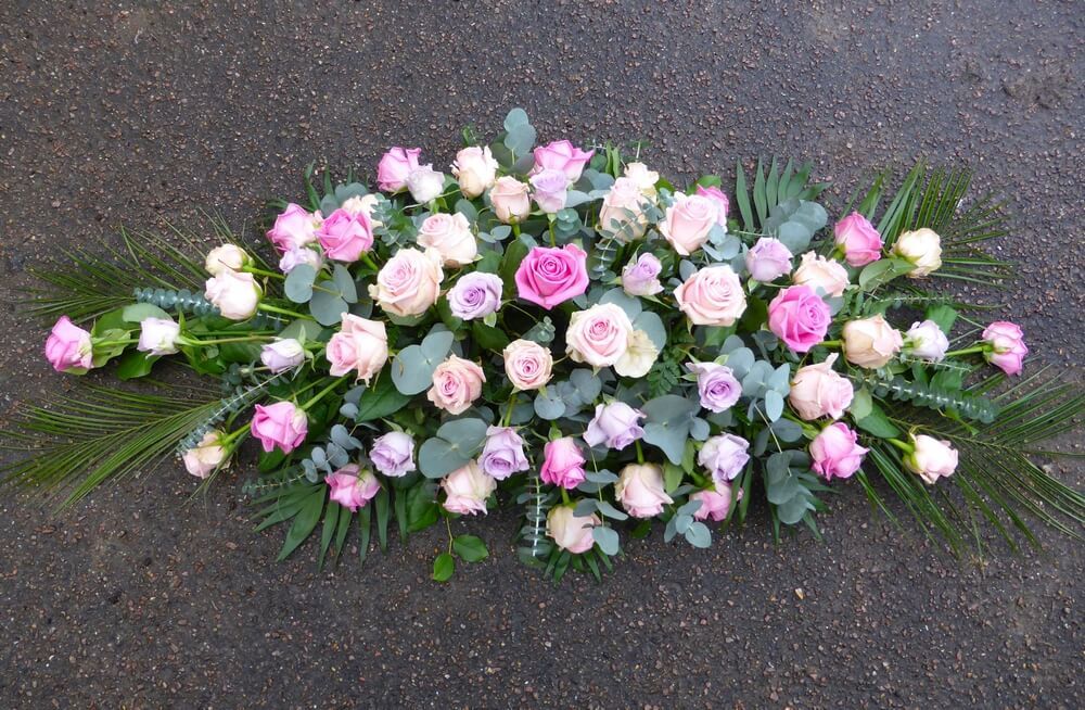 37. Spray of lilac, pale pink and deep pink Roses