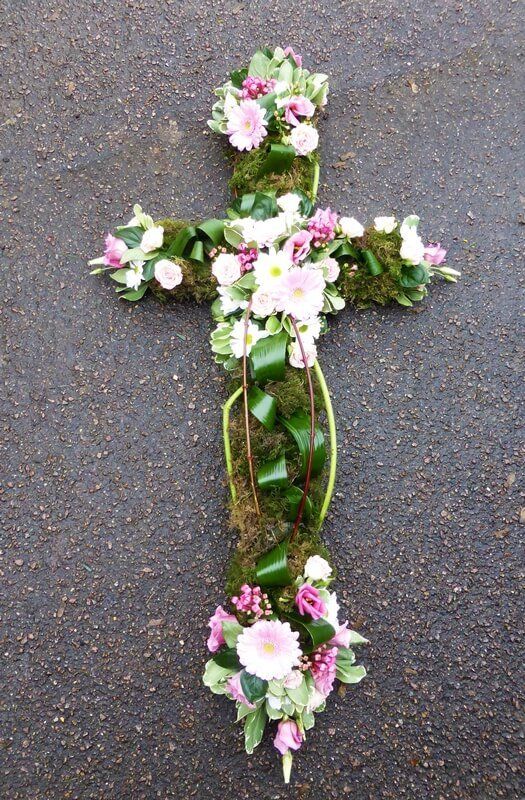 2.  4ft Natural Cross with Moss, pink Germinis and Lisianthus, Cornus, Bouvardia and Aspidistra