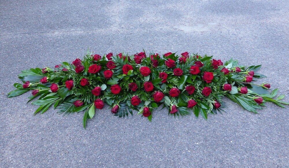 32. Full coffin spray of all red Roses