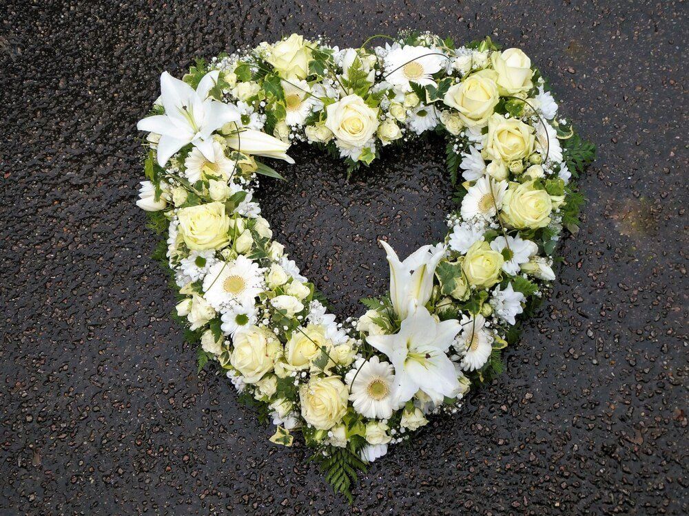 5.  Large hollow Heart in white flowers