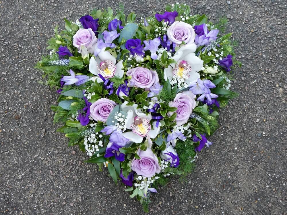 7.  Heart with Orchids, lilac Roses, Lisianthus, Freesias and Veronicas