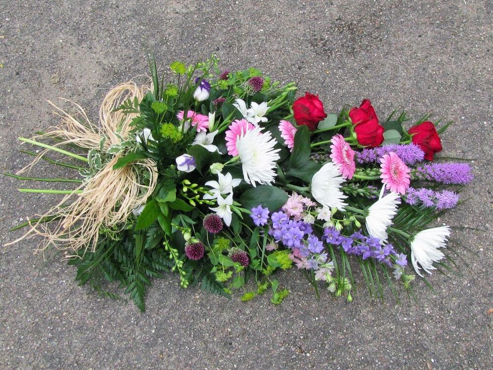 16. Sheaf with Raffia, Roses, Germini, Larkspur, Liatris, Chrysanthemums, Alliums, Bupleurum and Bridal Glads