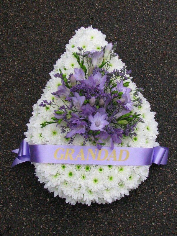 13. White Teardrop with lilac ribbon sash, lilac Freesias and Limonium